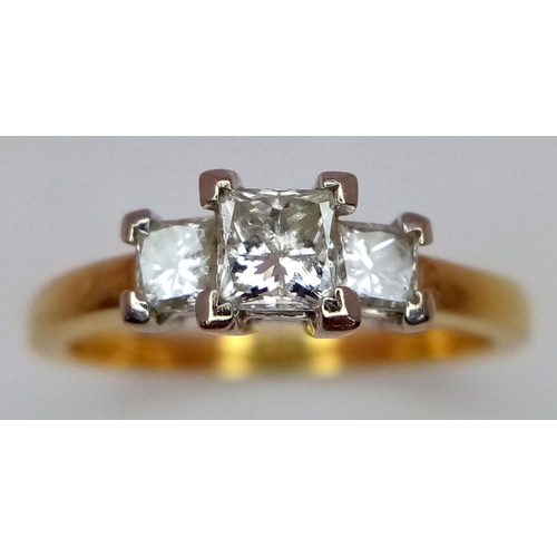 40 - AN 18K YELLOW GOLD 3 STONE DIAMOND RING. PRINCESS CUTS. 0.60CTW. 3.7G. SIZE N. GW3005.