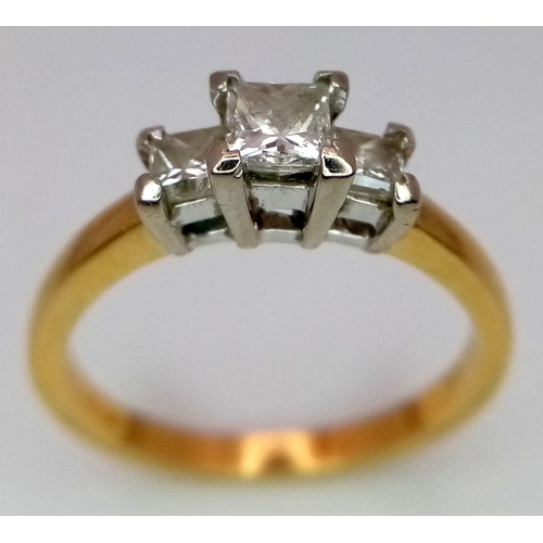 40 - AN 18K YELLOW GOLD 3 STONE DIAMOND RING. PRINCESS CUTS. 0.60CTW. 3.7G. SIZE N. GW3005.