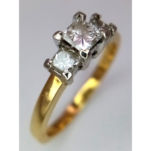 40 - AN 18K YELLOW GOLD 3 STONE DIAMOND RING. PRINCESS CUTS. 0.60CTW. 3.7G. SIZE N. GW3005.