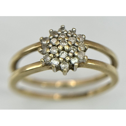 593 - A 9K YELLOW GOLD DIAMOND SPLIT SHANK CLUSTER RING. 0.20CT. 2.4G. SIZE L. SC3002.