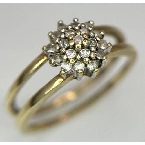 593 - A 9K YELLOW GOLD DIAMOND SPLIT SHANK CLUSTER RING. 0.20CT. 2.4G. SIZE L. SC3002.