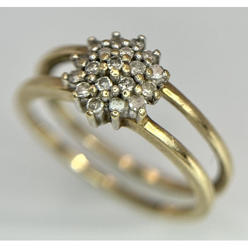 593 - A 9K YELLOW GOLD DIAMOND SPLIT SHANK CLUSTER RING. 0.20CT. 2.4G. SIZE L. SC3002.