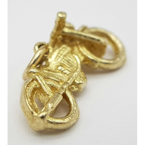 600 - A 9K YELLOW GOLD MOTORCYCLE CHARM - 2.1G. SC3004.