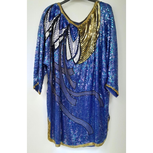 603 - A vintage sequin tunic dress, fabulous 80's shoulder pads, fully lined, fits a UK size 12. Please se... 