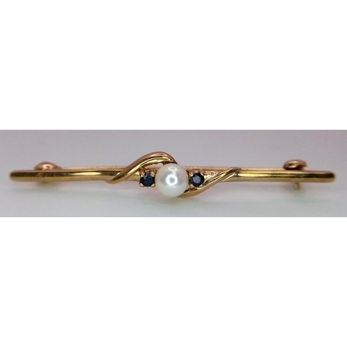 610 - A Vintage 9k Yellow Gold Pearl and Sapphire Bar Brooch. 5cm. 2.65g total weight.