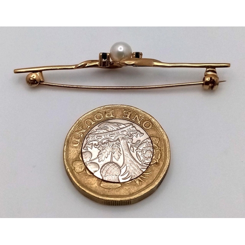 610 - A Vintage 9k Yellow Gold Pearl and Sapphire Bar Brooch. 5cm. 2.65g total weight.