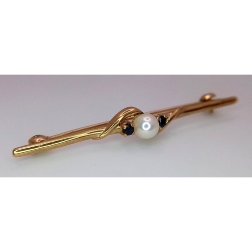 610 - A Vintage 9k Yellow Gold Pearl and Sapphire Bar Brooch. 5cm. 2.65g total weight.