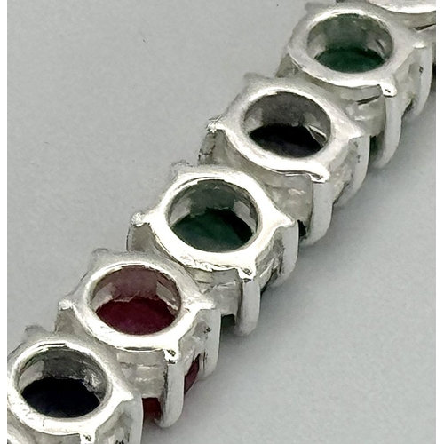 611 - A Ruby, Emerald and Sapphire Tennis Necklace - Set in 925 Silver. 45cm length. CD-1495