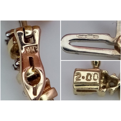 82 - A 9K YELLOW GOLD DIAMOND TENNIS BRACELET. 2CTW. 14.7G. 19CM. SC3065