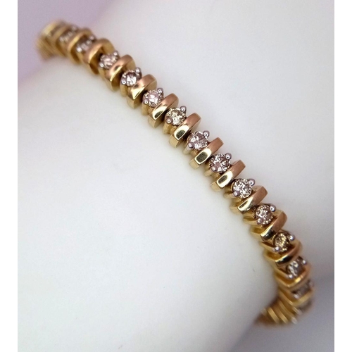 82 - A 9K YELLOW GOLD DIAMOND TENNIS BRACELET. 2CTW. 14.7G. 19CM. SC3065