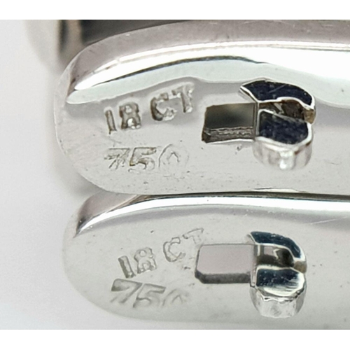 186 - A PAIR 18K WHITE GOLD DIAMOND SET EARRINGS - 0.15CTW. 4.2G. SC3063.