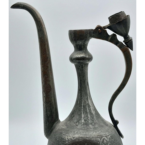 1674 - A 19th Century, Persian, solid “silvered” copper AFTABA pitcher with calligraphy engravings. Dimensi... 