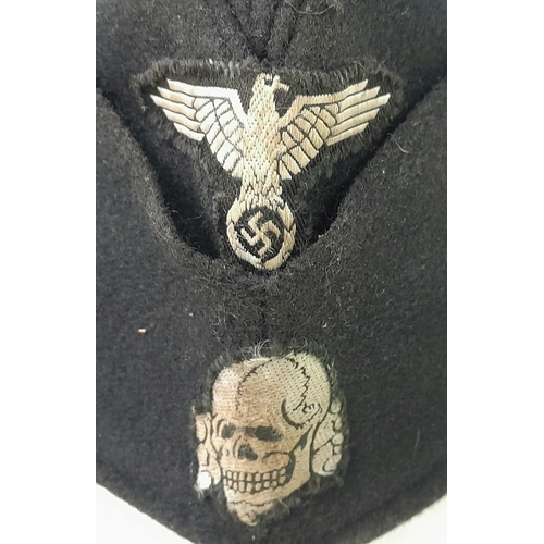 13 - A Waffen SS M40 Overseas Cap. Overall very good condition. Insignia passes the black light test.