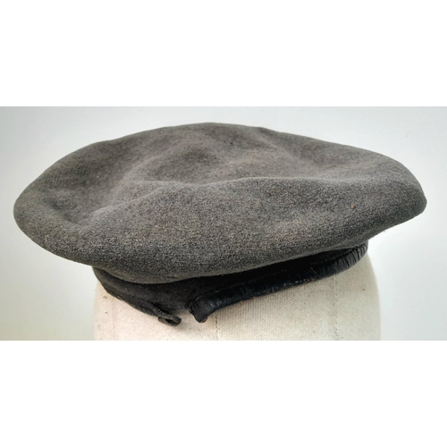 208 - A WW2 1944 Dated British Made RAF Beret with a Polish in exile Airforce cap badge. The badge is mark... 