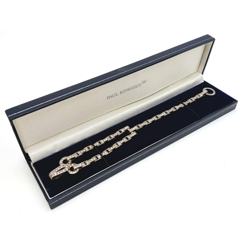 111 - Genuine Paul Kennedy hallmarked SILVER TENNIS BRACELET.Having Single and Tramline double row of Zirc... 