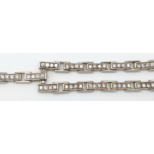 111 - Genuine Paul Kennedy hallmarked SILVER TENNIS BRACELET.Having Single and Tramline double row of Zirc... 