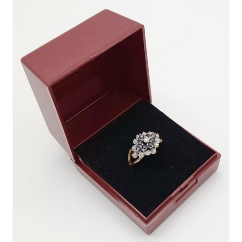 132 - Impressive 9 carat GOLD,DIAMOND and SAPPHIRE CLUSTER RING. Full UK hallmark. Complete with ring box.... 