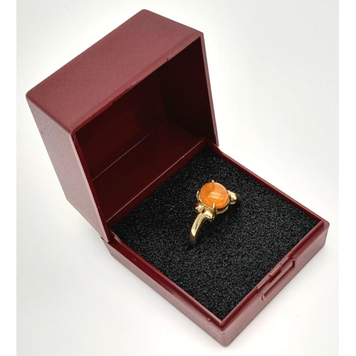 195 - Attractive 9 carat GOLD RING having an ORANGE CARNELIAN CABOCHON mounted to top. Full UK hallmark. C... 