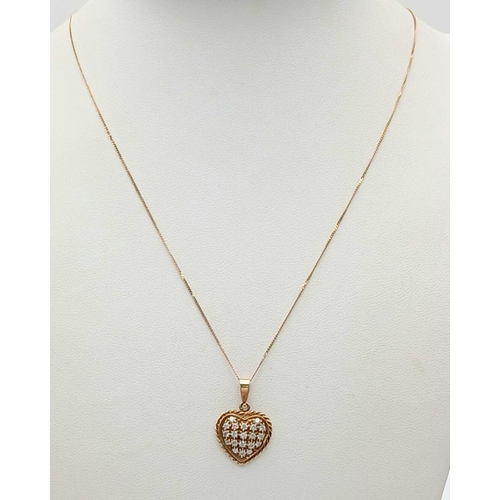 223 - Beautiful 9 carat GOLD ‘HEART’ PENDANT, cluster set with sparkling Crystal detail. Mounted on a 9 ca... 
