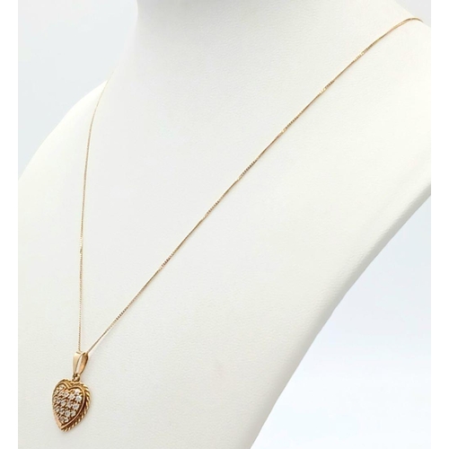 223 - Beautiful 9 carat GOLD ‘HEART’ PENDANT, cluster set with sparkling Crystal detail. Mounted on a 9 ca... 