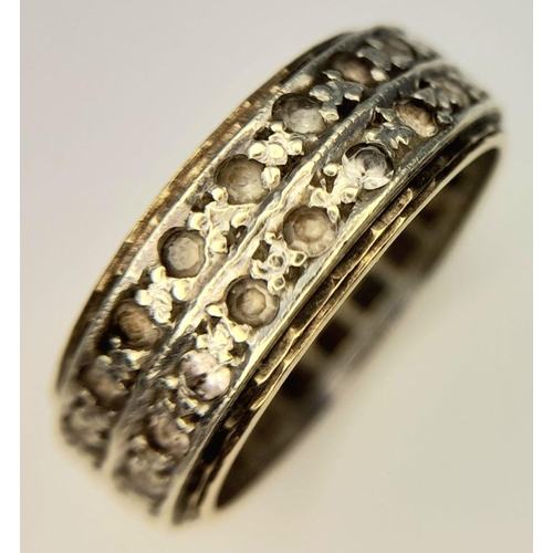 230 - Impressive and unusual 9 carat GOLD DOUBLE ROW ETERNITY RING. Full UK hallmark. Complete with Jewell... 
