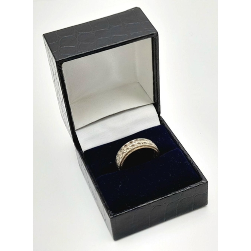 230 - Impressive and unusual 9 carat GOLD DOUBLE ROW ETERNITY RING. Full UK hallmark. Complete with Jewell... 