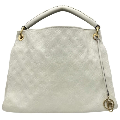 37 - A Louis Vuitton Ivory Empreinte Bag. Monogram leather exterior with gold-toned hardware, single hand... 