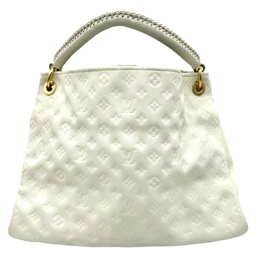 37 - A Louis Vuitton Ivory Empreinte Bag. Monogram leather exterior with gold-toned hardware, single hand... 