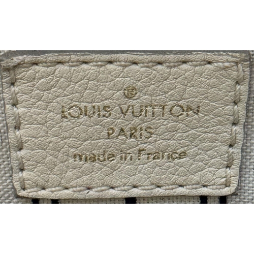 37 - A Louis Vuitton Ivory Empreinte Bag. Monogram leather exterior with gold-toned hardware, single hand... 