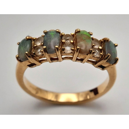 42 - An extremely pretty fully hallmarked 9 carat GOLD, OPAL & TOPAZ RING. Complete with ring box . 2.9 g... 