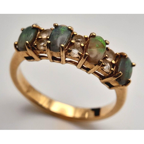 42 - An extremely pretty fully hallmarked 9 carat GOLD, OPAL & TOPAZ RING. Complete with ring box . 2.9 g... 