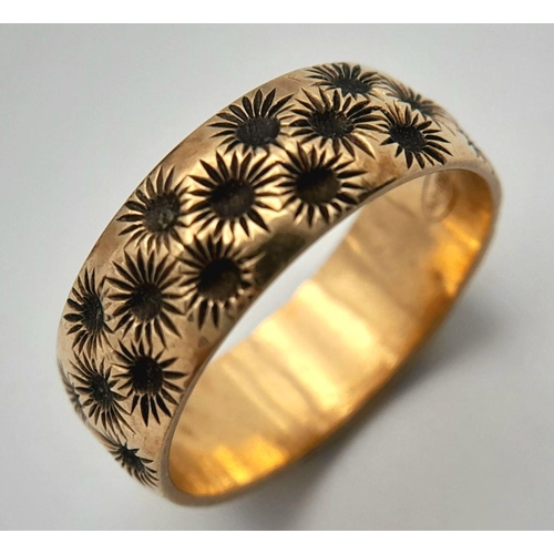 84 - Impressive Hallmarked 9 carat YELLOW GOLD BAND RING covered with chased floral detail. Complete with... 