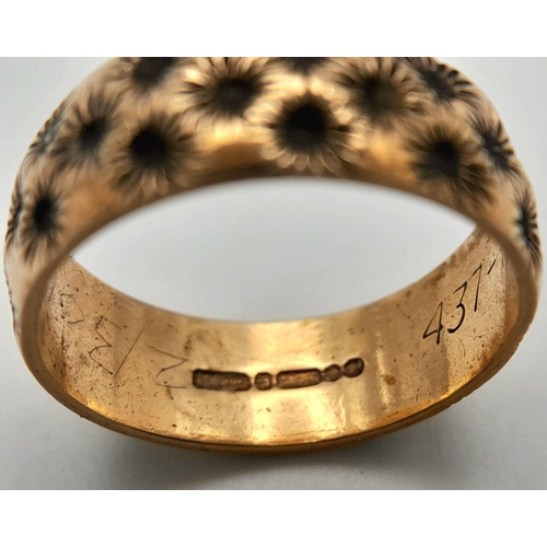 84 - Impressive Hallmarked 9 carat YELLOW GOLD BAND RING covered with chased floral detail. Complete with... 