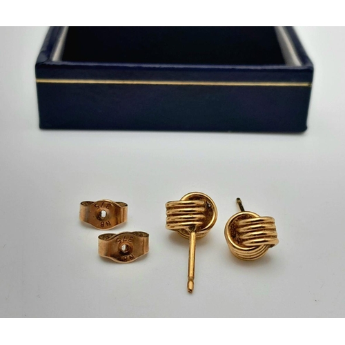 91 - Classic pair of 9 carat GOLD ‘KNOT’ EARRINGS. Complete with Gold Backs. Presented in jewellers earri... 