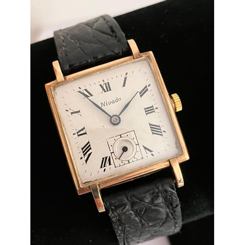 7 - Vintage 9 CARAT GOLD NIVADA WRISTWATCH. Having square white face with black Roman numerals. Seconds ... 