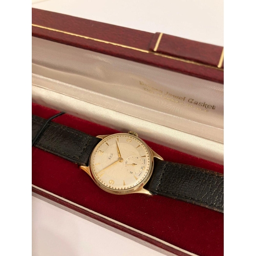 77 - Gentlemans vintage 9 carat GOLD ‘LIMIT’  WRISTWATCH. Swiss made and set in a hallmarked Denison Gold... 