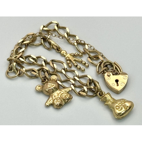 106 - A 9K Gold Charm Bracelet with Heart Clasp. 18cm. 7.1g total weight.