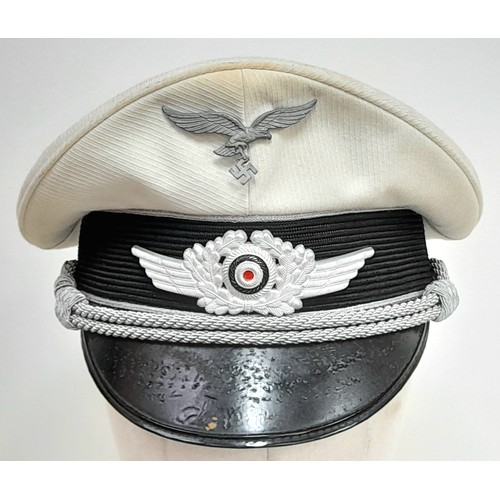 27 - A WW2 Luftwaffe White Topped Tropical Officers Visor Cap.