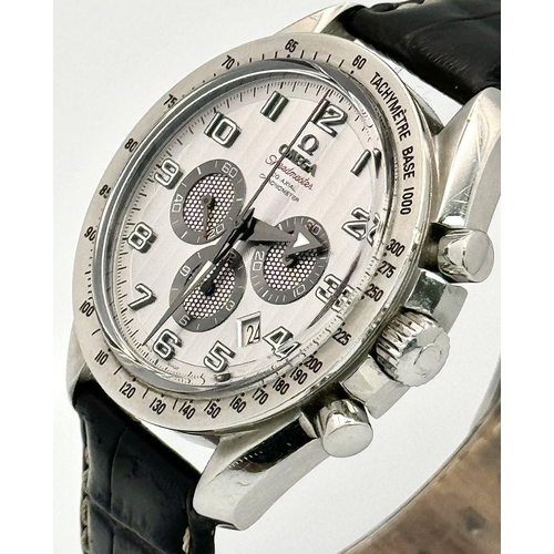 185 - An Omega Speedmaster Broad Arrow Automatic Chronograph Gents Watch. Black leather strap. Stainless s... 