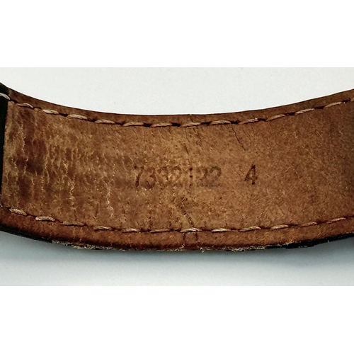 185 - An Omega Speedmaster Broad Arrow Automatic Chronograph Gents Watch. Black leather strap. Stainless s... 