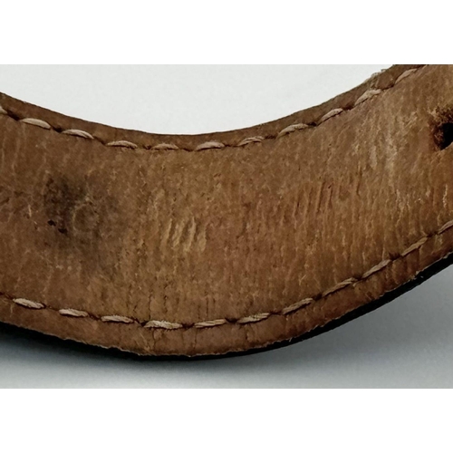 185 - An Omega Speedmaster Broad Arrow Automatic Chronograph Gents Watch. Black leather strap. Stainless s... 