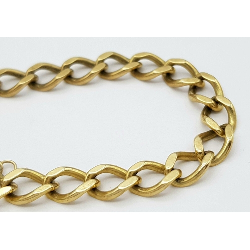 93 - A 9K Yellow Gold Curb Bracelet with Heart Clasp. 16cm. 11.15g weight.