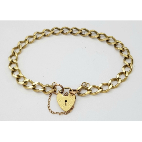 93 - A 9K Yellow Gold Curb Bracelet with Heart Clasp. 16cm. 11.15g weight.