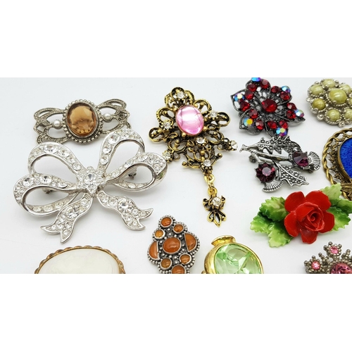 1678 - A Wonderful Vintage Collection of Over Twenty Colourful Brooches. A few head-turners! Comes in a gre... 