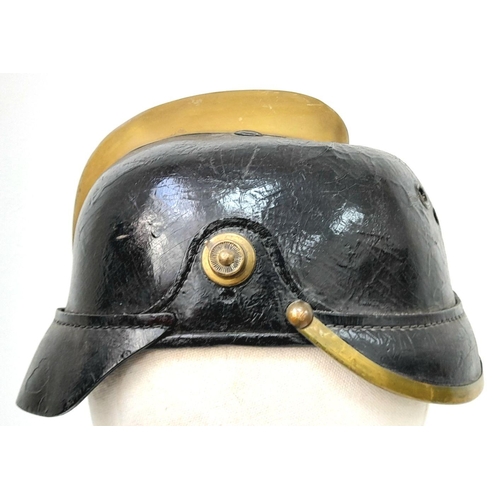 152 - Unusual Imperial German Fire Helmet. A standard 1915 Pattern Army Pickelhaube Marked to the 19th Inf... 