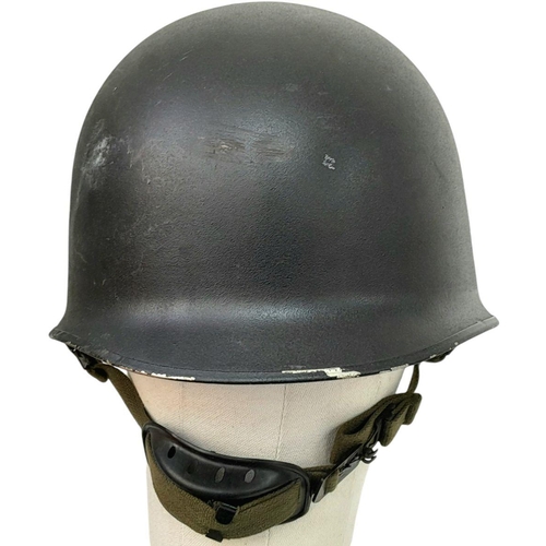 404 - A Post War Danish M1 Police Helmet with Removable Liner and Chinstrap. The liner is badged to the Da... 