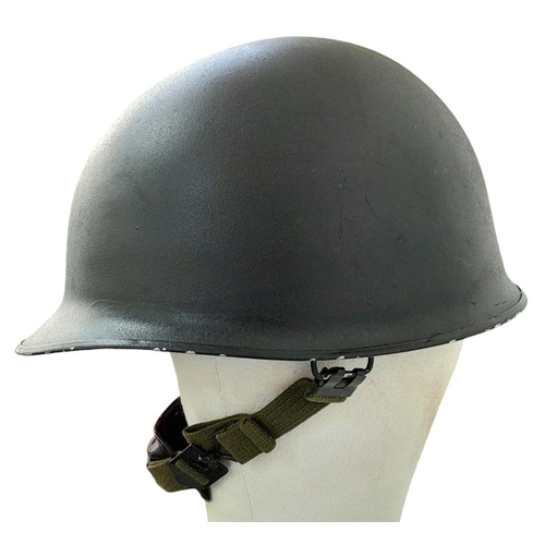 404 - A Post War Danish M1 Police Helmet with Removable Liner and Chinstrap. The liner is badged to the Da... 