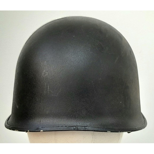 404 - A Post War Danish M1 Police Helmet with Removable Liner and Chinstrap. The liner is badged to the Da... 