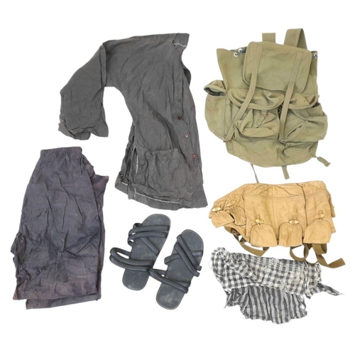 349 - Vietnam War Era Vietcong Back Pack containing a conical hat, Guerrilla Scarf, Ho Chi Minh Tyre Sanda... 