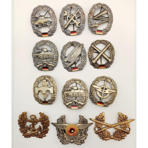 517 - 12 x Post War German Bundeswehr Cap Badges.